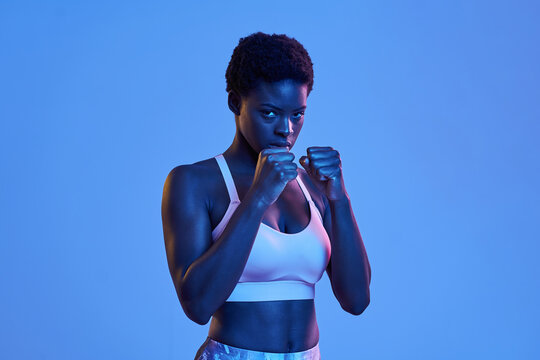 Black fighter looking at camera