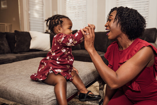 Mom Giving daughter high five