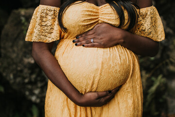 Beautiful Black Woman Holding Pregnant Belly