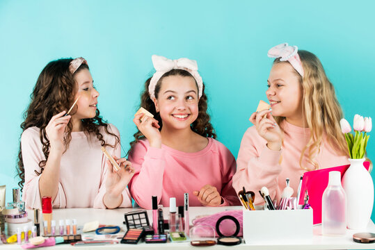 Little Sisters In Retro Fashion Headscarf. Makeup For Kids. Group Of Happy Friends At Spa. Friendship Party With Cosmetic. Relax And Having Fun. Small Girls In Beauty Salon. Young And Beautiful