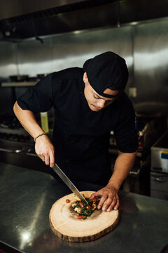 Chef in Kitchen Cooking