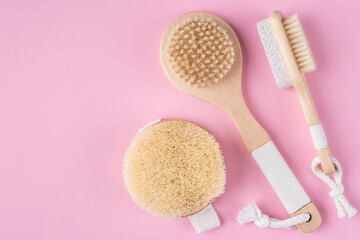 Fototapeta na wymiar Flat lay top above overhead close up view photo of massage brushes isolated on pastel color background with empty blank space
