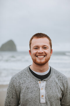 Portrait of Smiling Man on Beach