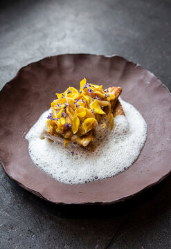 Seabass with citrics and flowers