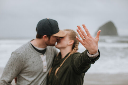 Woman Showing off Engagement Ring after Marriage Proposal