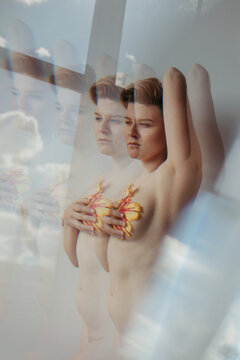 Double exposure portrait of woman in clouds