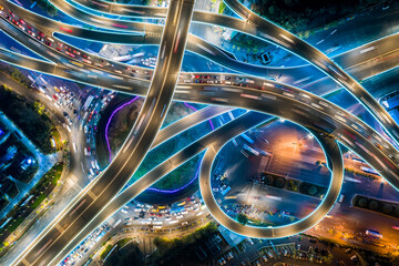 Express way night traffic top view. Road roundabout
