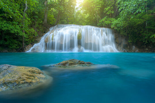 Beautiful waterfall in deep forest at Erawan National Park, Thailand. © yotrakbutda