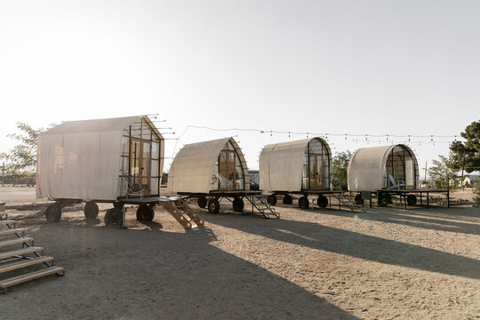 Covered wagons in sunlight