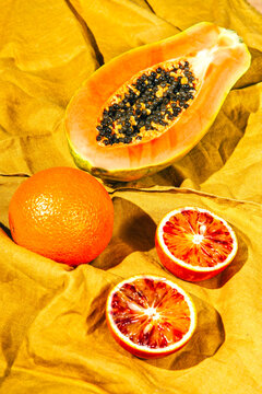 Papaya, oranges, a lemon and a quince