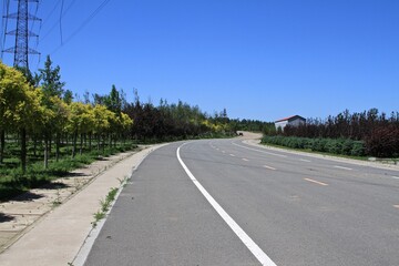 Fototapeta premium Newly paved straight road in countryside