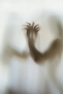 a pair of choreographers posing using their hands in artistically artistic lines