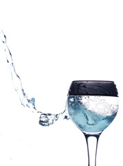 splash of drink in a beautiful crystal glass