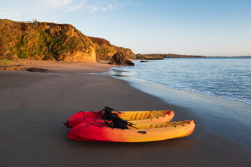 Kayaks The Beach During Sunrise