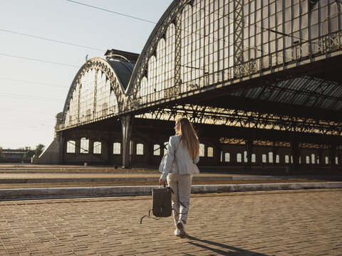Traveler walking to station catching train