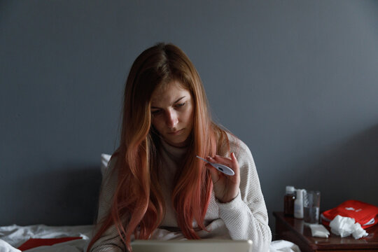 Girl with flu keeping distance and receiving treatment