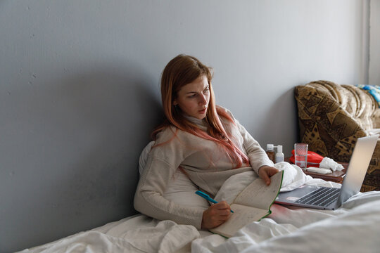 Sick female having online appointment