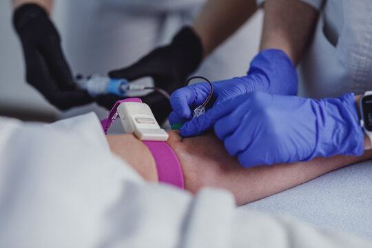 Lab workers taking blood for lab test
