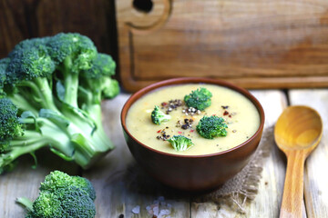 Selective focus. Broccoli cream soup in a bowl. Healthly food.