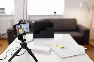 Teacher connecting with schoolchildren in video chat