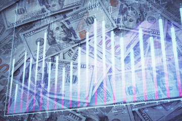 Double exposure of forex graph drawing over us dollars bill background. Concept of financial markets.