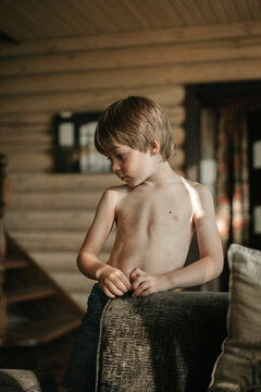 Little boy in a country house.