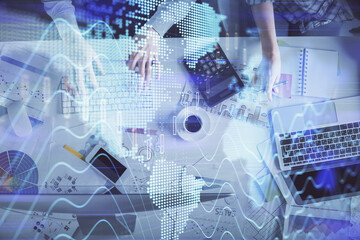 Double exposure of man and woman working together and financial chart hologram drawing. market analysis concept. Computer background. Top View.