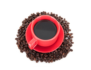 A cup of brewed pure coffee on a pile of coffee beans on a white background