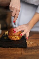 person slicing bread