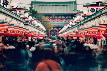 Crowd of people walking on Nakamise Dori street of the Asakusa Kaminarimon in Tokyo, Japan