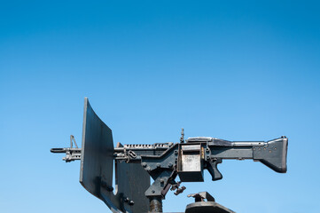 gun weapons,machine gun on blue sky