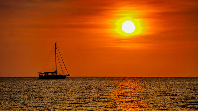 Sailing boat photography on the sea at sunset
