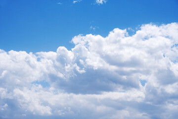 Blue sky and white clouds in the sky on a sunny day