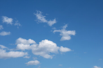Blue sky and white clouds in the sky on a sunny day