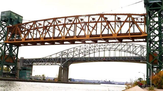 A Canadian lift bridge descends from its maximum height to three-quarters of its travel.
