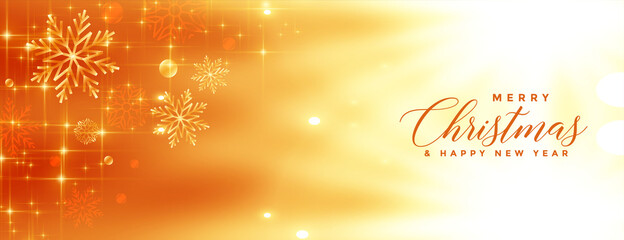 Fototapeta na wymiar golden shiny merry christmas snowflakes banner design