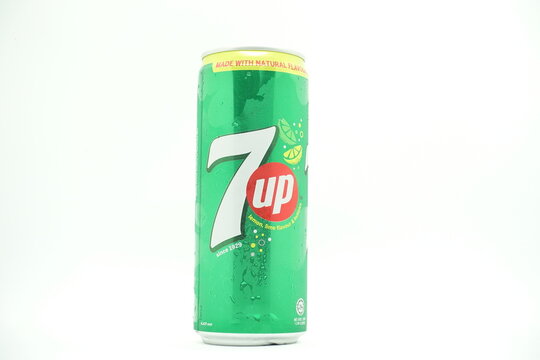 A can of 7up drink against isolated on white background
