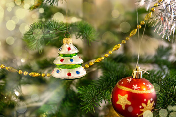 Christmas decorations on the Christmas tree. Bokeh. The spirit of the new year.