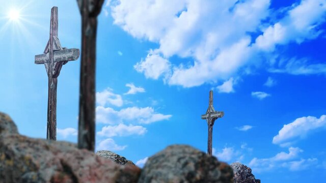 3 crosses with a cloud timelapse background in the blue sky.