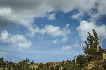 blue sky and the vegetation of huaraz in front of the sun