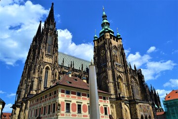 Prague and Czech Republic during sunny day. Cathedral St. Vitus, Prague, Czech Republic. Blue sky white cloud.