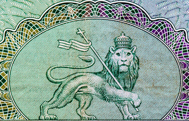 Lion holding a cross. Portrait from Ethiopia 1 Dollar 1961 Banknotes.