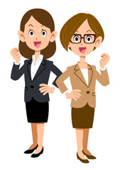 背中合わせでガッツポーズするスーツ姿の女性
