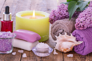 Spa products and accessories. Aromatic oil, soap, sea salt, towels