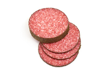 Sliced Salami with spices, isolated on white background
