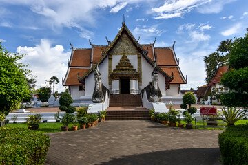 Fototapeta na wymiar Landscape view of the Buddhist sanctuary in Lanna architecture style of Wat Phumin temple in Nan province, Thailand 