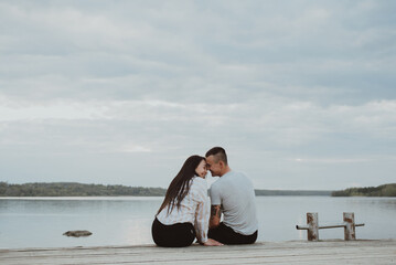 loving young happy couple hugging on the beach