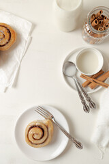 cinnamon buns and icing sugar topping