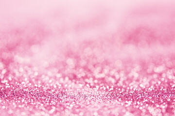 Obraz premium blurred abstract sparkling pink bokeh background. festive decoration for website banner and card concept. soft focus