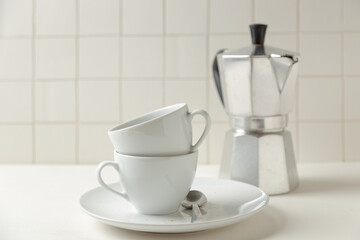 coffee cup and coffee maker